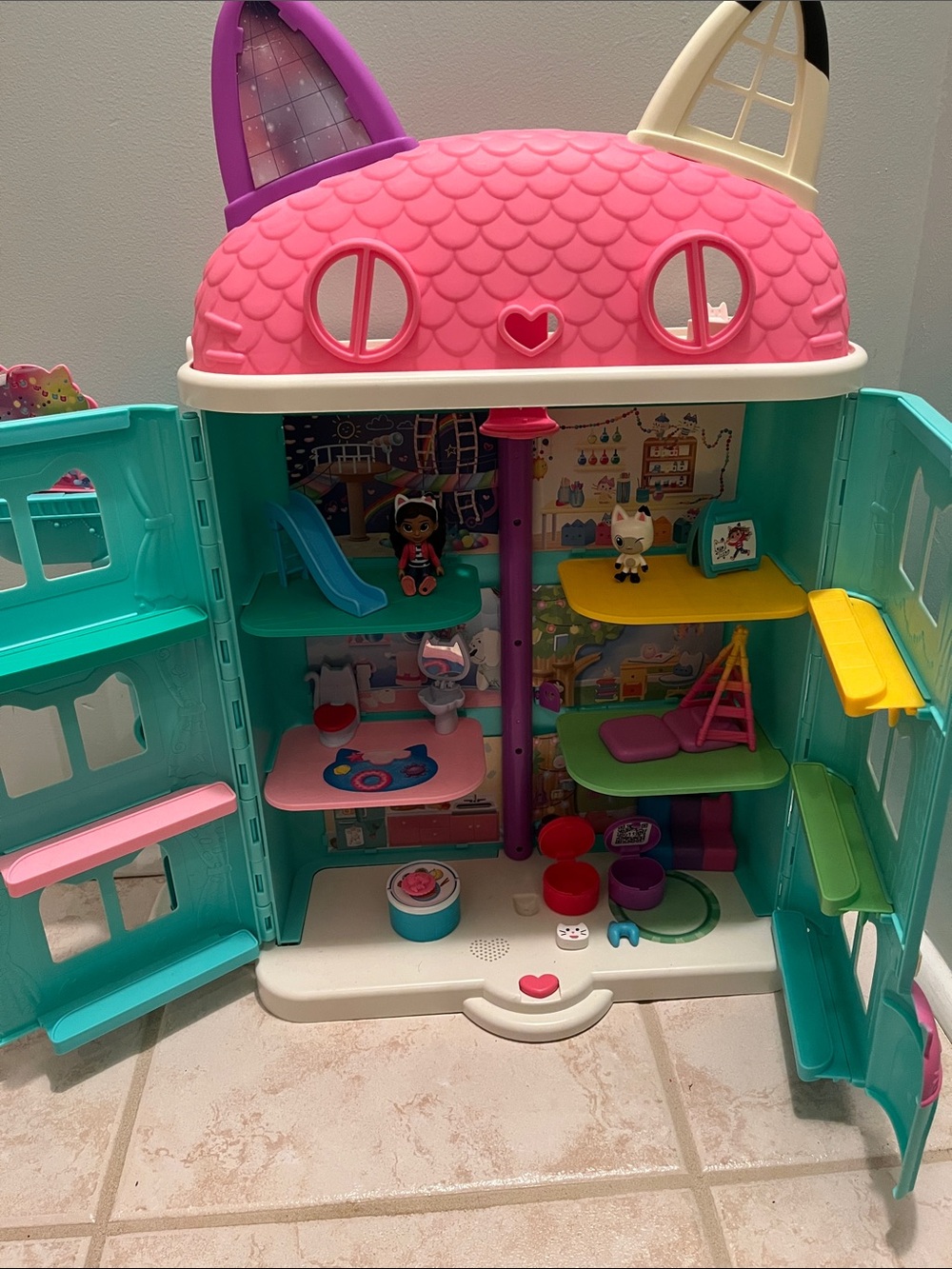 Gabby’s Dollhouse.  Kids Playhouse Dollhouse Toy - Pink, Teal & Yellow